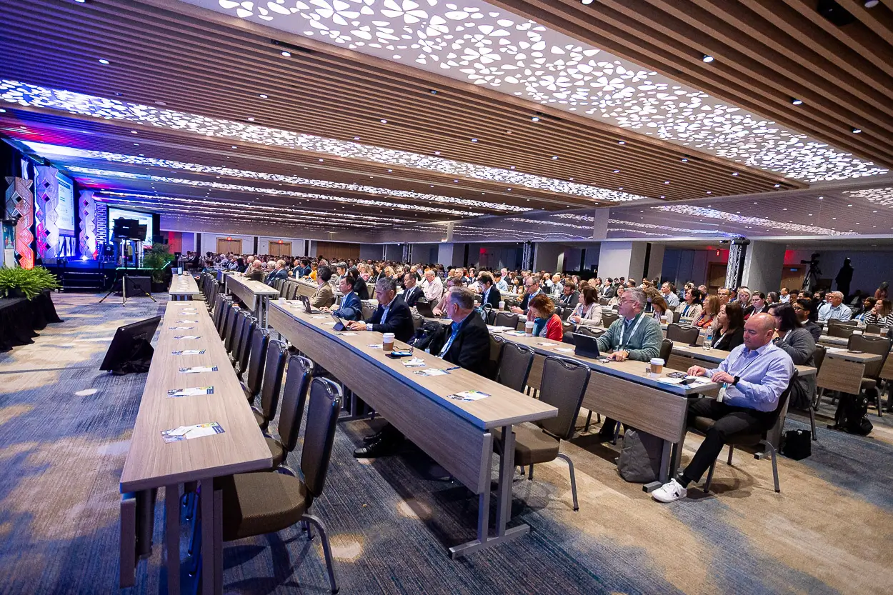 Large professional conference in Washington DC showing stage coverage, audience scale, and corporate event production