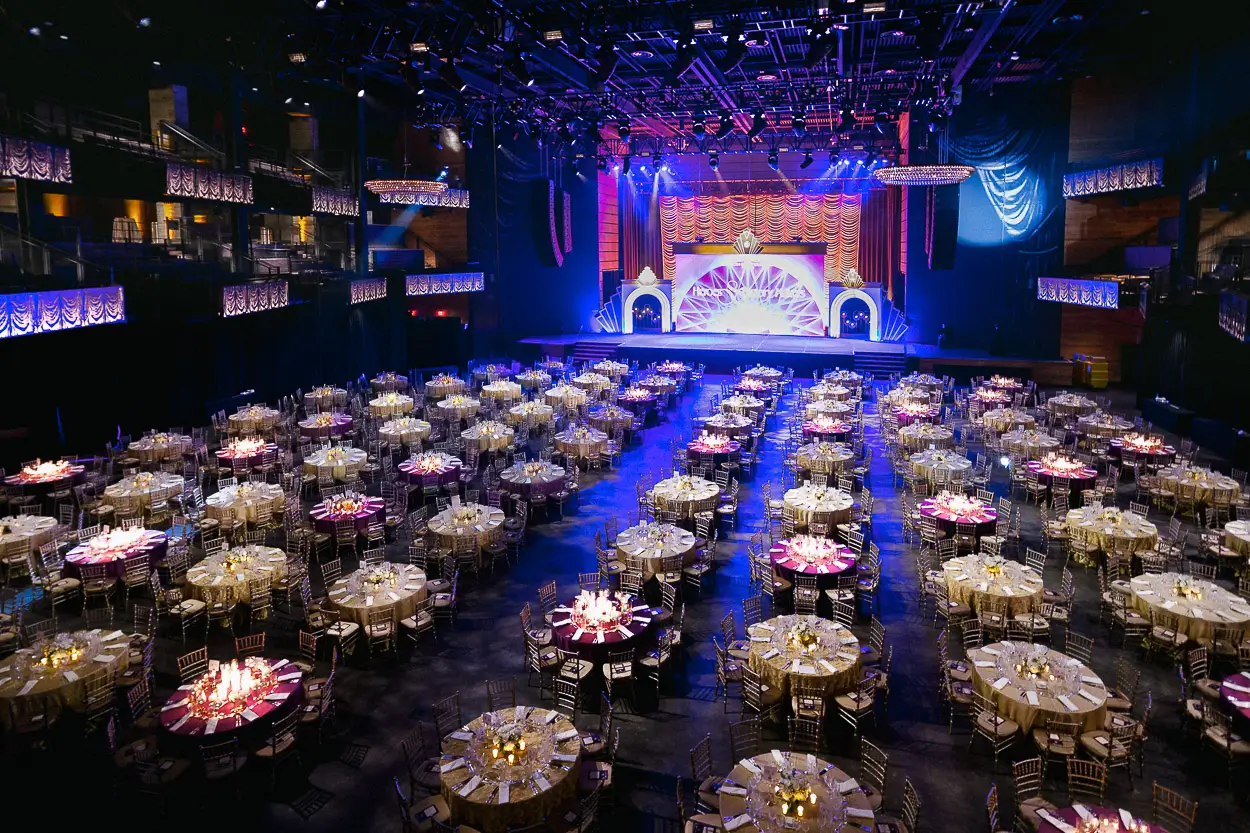Corporate gala dinner setup at The Anthem in Washington DC with stage production and guest tables