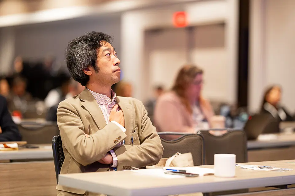 Attendee listening during a breakout session at the FDA-PDA Annual Conference