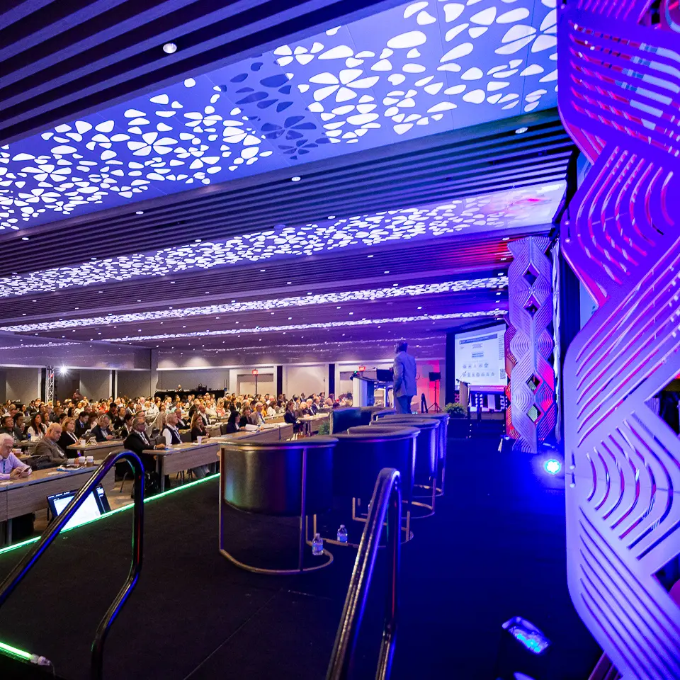 Featured FDA-PDA Annual Conference stage lighting and empty aisle view inside The Westin ballroom