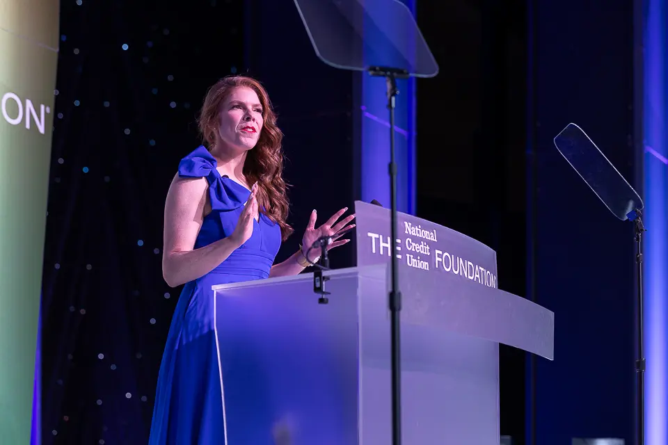 Award presenter speaking on stage during the Herb Wegner Awards 2026 program.