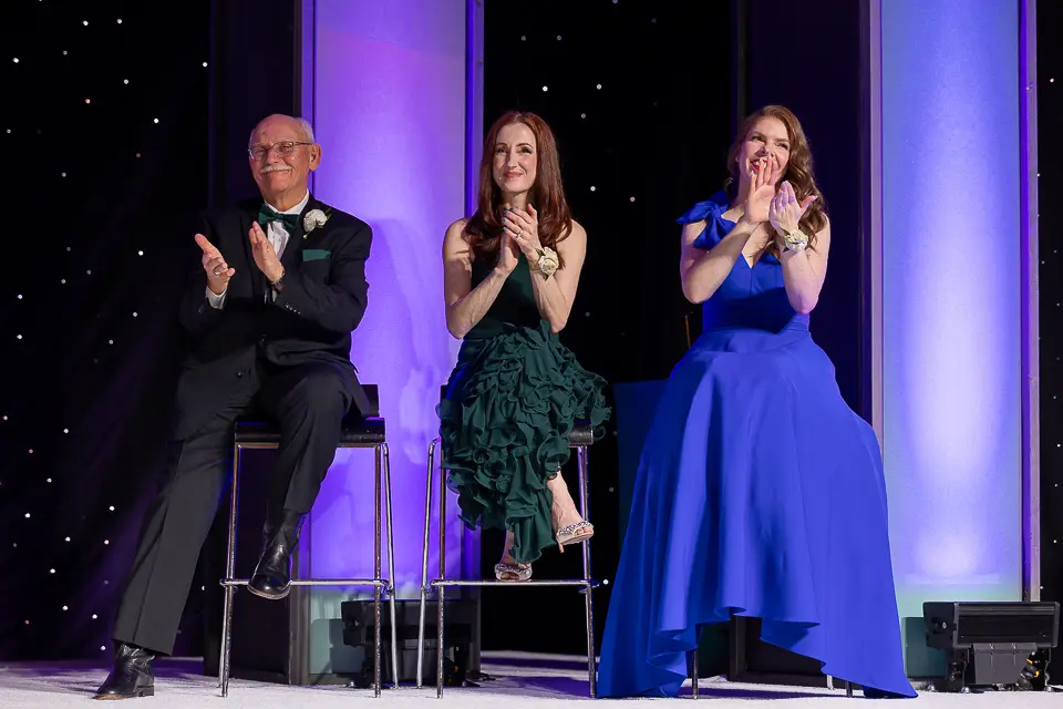 Presenters applauding on stage during the Herb Wegner Awards 2026 recognition program.