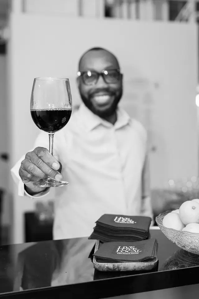 The Scout Guide Washington DC launch party wine toast portrait