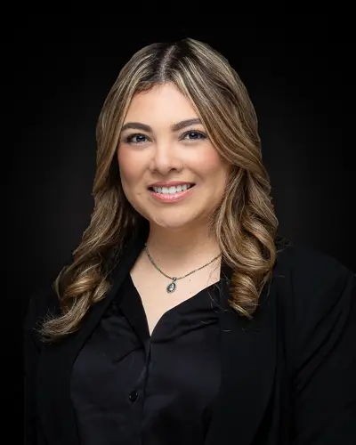 Professional business headshot of woman in black blazer photographed in Washington DC by District Pixel
