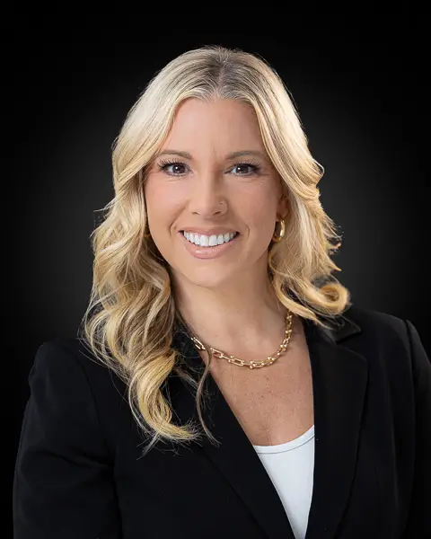 Professional corporate headshot of a blonde executive woman photographed in Washington DC by District Pixel