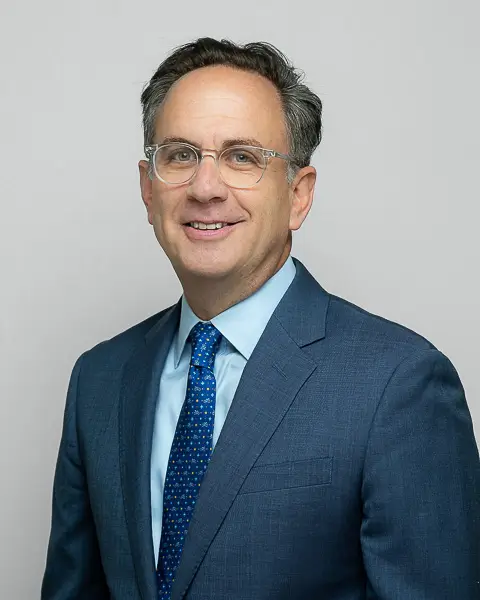 Professional corporate headshot of a man photographed in studio in Washington DC by District Pixel
